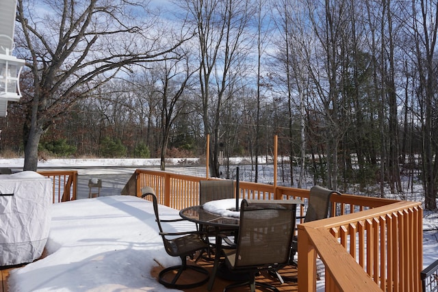 view of snow covered deck