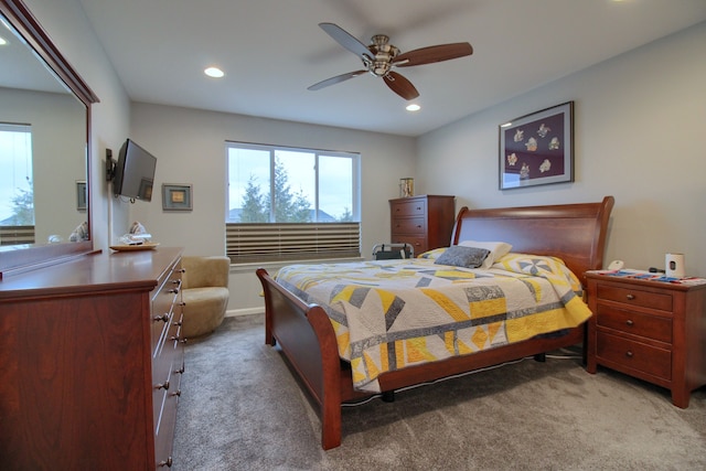 carpeted bedroom with ceiling fan