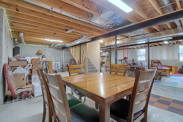 dining room featuring concrete flooring