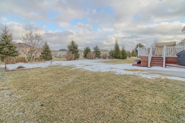 view of yard featuring a wooden deck