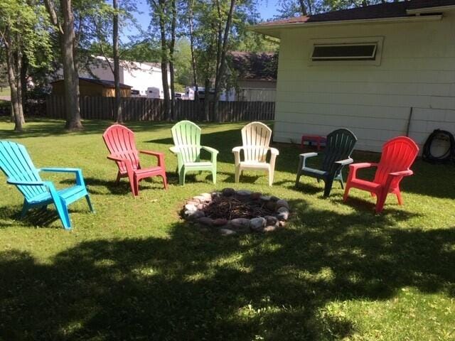 view of yard with a fire pit