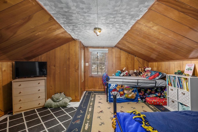 carpeted bedroom with lofted ceiling, wooden ceiling, and wood walls