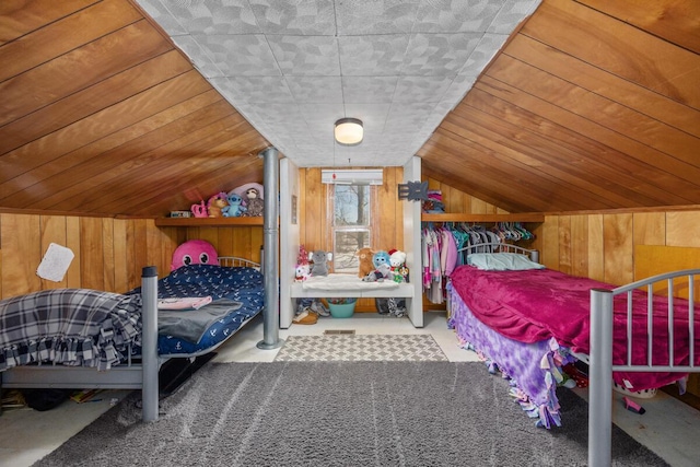 bedroom with wood ceiling, wooden walls, vaulted ceiling, and carpet