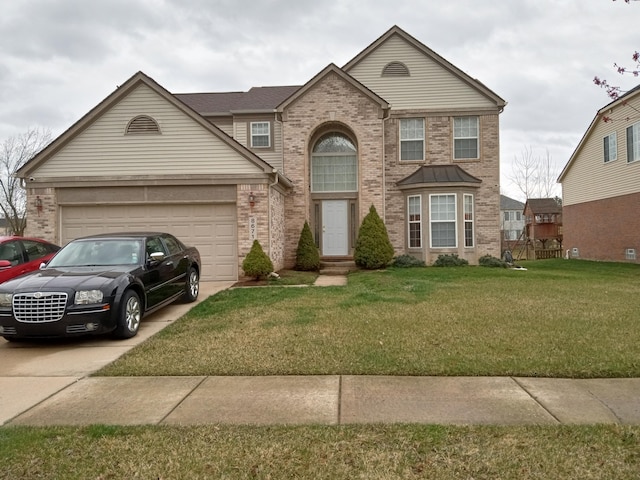 view of front facade featuring a garage and a front yard