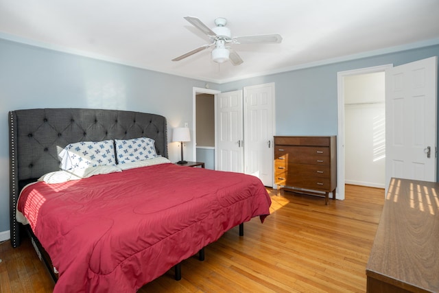 bedroom featuring ceiling fan and hardwood / wood-style floors