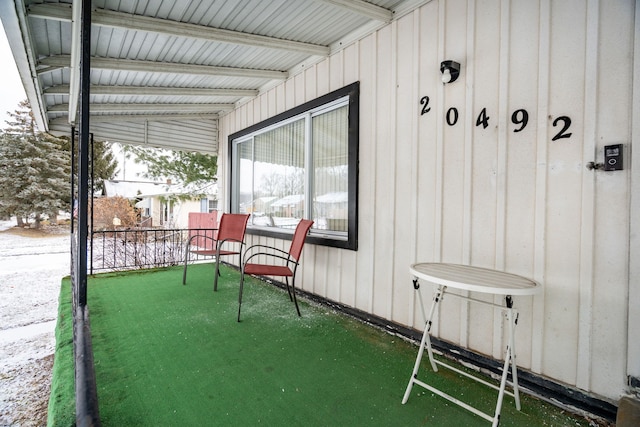 view of snow covered patio