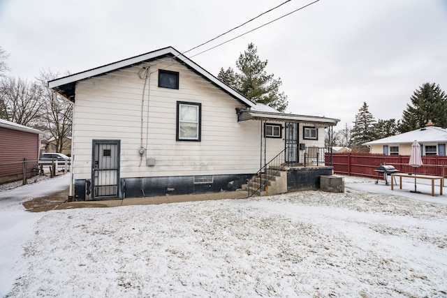 view of snow covered property