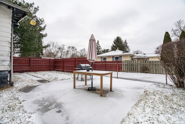 view of snow covered patio