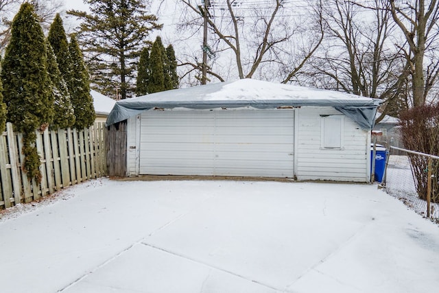 view of snow covered garage