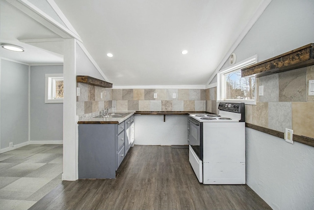 kitchen with sink, white range with electric cooktop, gray cabinetry, dark hardwood / wood-style flooring, and vaulted ceiling