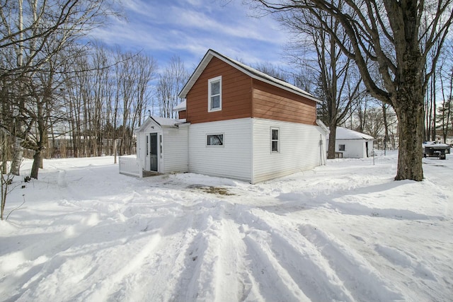 view of snow covered property