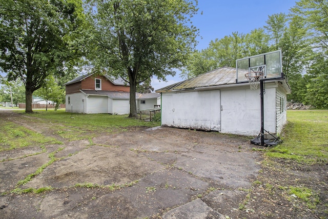 239 Laurel St, Walkerville, MI 49459 - view of side of property with a lawn and an outbuilding