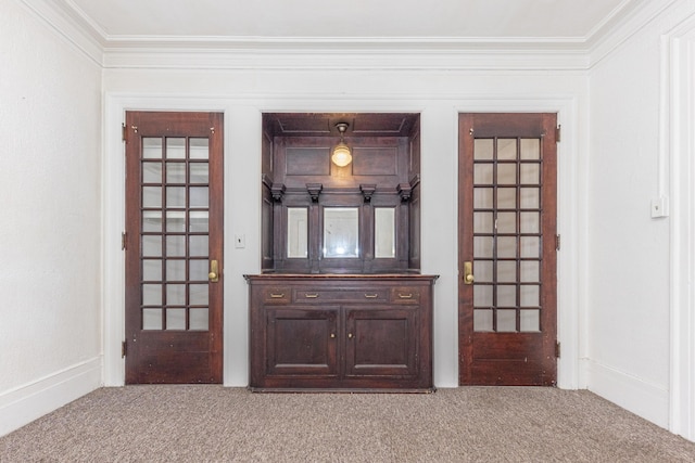 interior space with crown molding