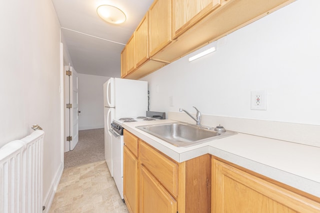 kitchen with white electric stove, sink, light brown cabinets, and radiator