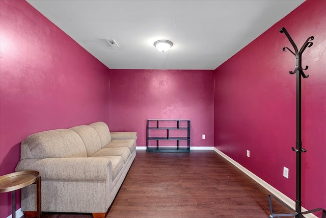 living area featuring hardwood / wood-style flooring