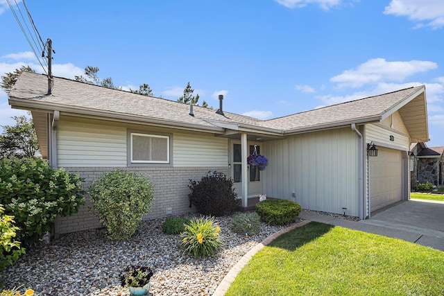 ranch-style house featuring a garage