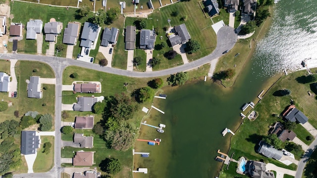 bird's eye view with a water view