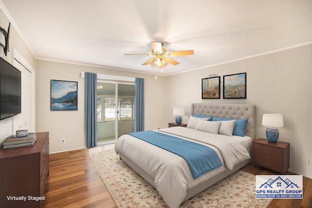 bedroom with crown molding, ceiling fan, and light wood-type flooring