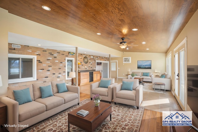 living room with hardwood / wood-style flooring, brick wall, wooden ceiling, and ceiling fan