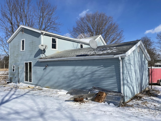 view of snow covered property