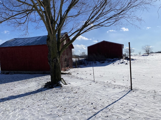 view of yard covered in snow