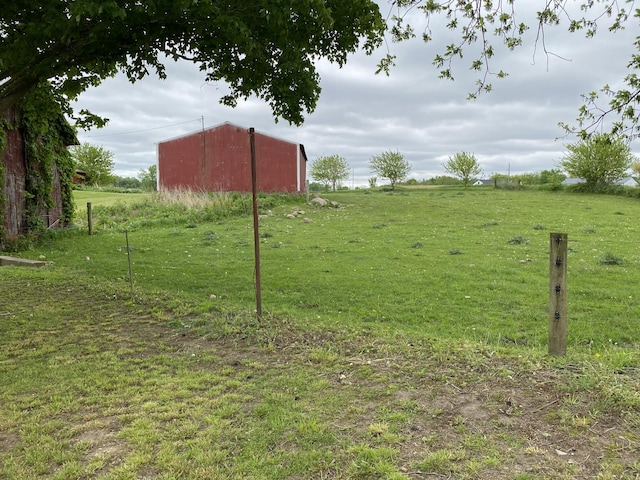 119 W Pearl Rd, Coldwater, MI 49036 - view of grassy yard with an outbuilding
