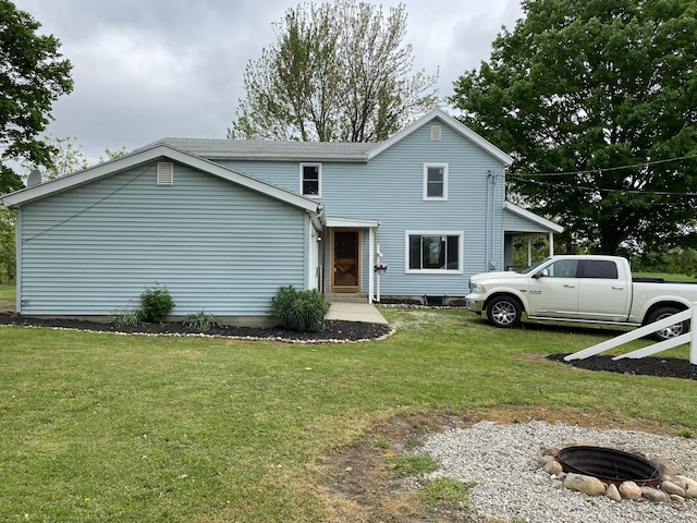 119 W Pearl Rd, Coldwater, MI 49036 - traditional home featuring a fire pit and a front lawn
