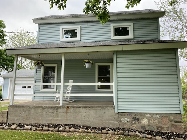119 W Pearl Rd, Coldwater, MI 49036 - view of front of property featuring a porch