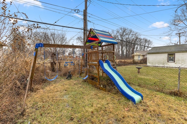 view of jungle gym with a lawn