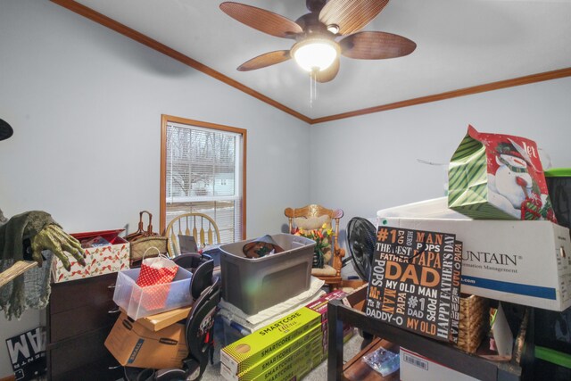 interior space with crown molding and ceiling fan