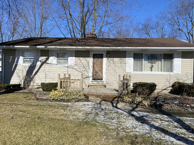 view of front of house with a front lawn