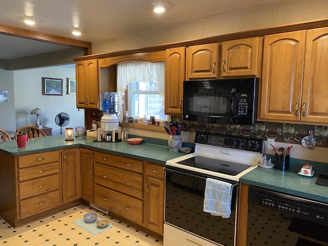 kitchen with beam ceiling and black appliances