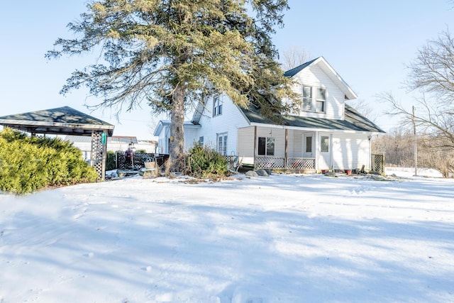 view of front of property with a gazebo and a porch