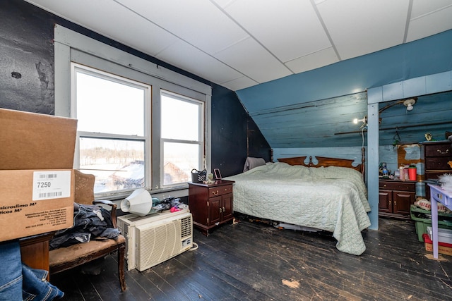 bedroom featuring vaulted ceiling and dark hardwood / wood-style floors