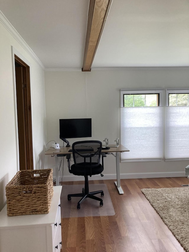 office area with crown molding, beam ceiling, and hardwood / wood-style floors