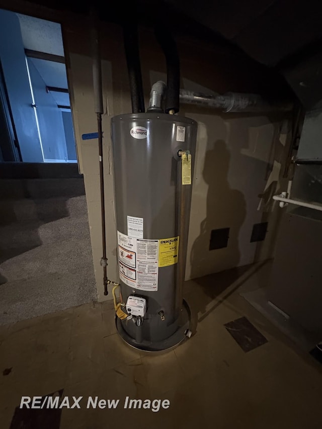 utility room with water heater