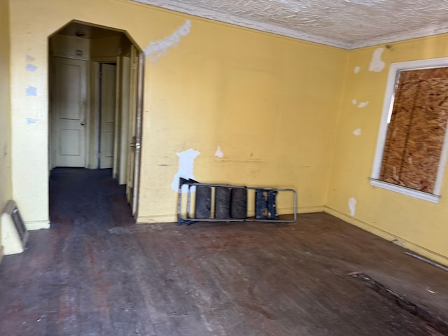 empty room featuring dark wood-type flooring