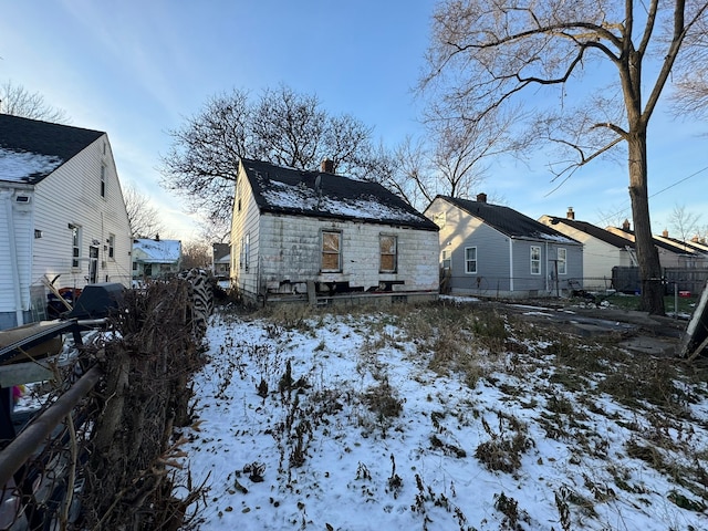 view of snow covered house