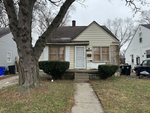 bungalow with a front yard