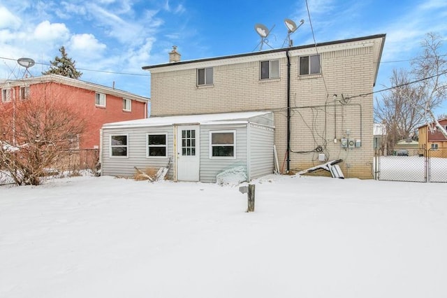 view of snow covered house