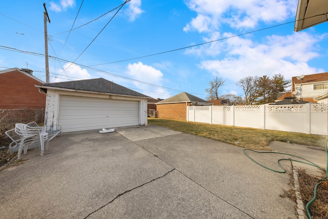 garage with a yard