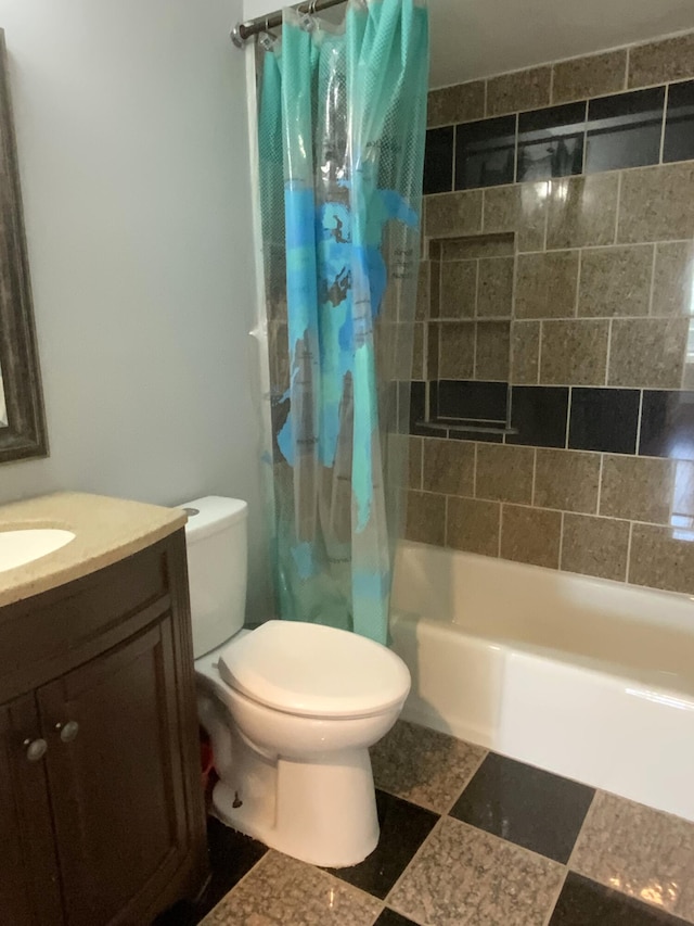 full bathroom featuring vanity, toilet, and shower / bath combo with shower curtain