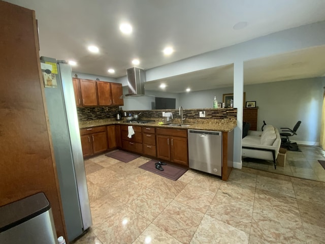 kitchen featuring sink, tasteful backsplash, ventilation hood, dark stone counters, and stainless steel appliances