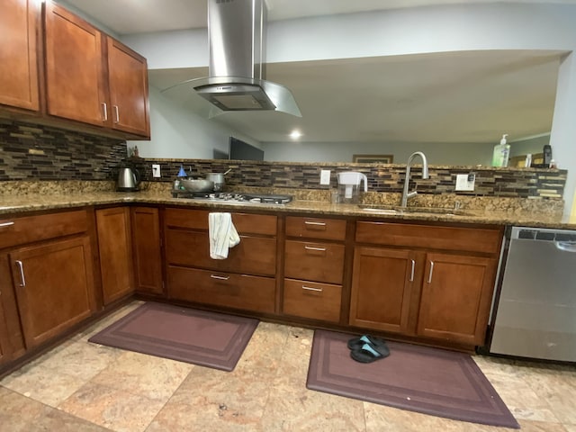 kitchen featuring dark stone countertops, sink, appliances with stainless steel finishes, and island exhaust hood