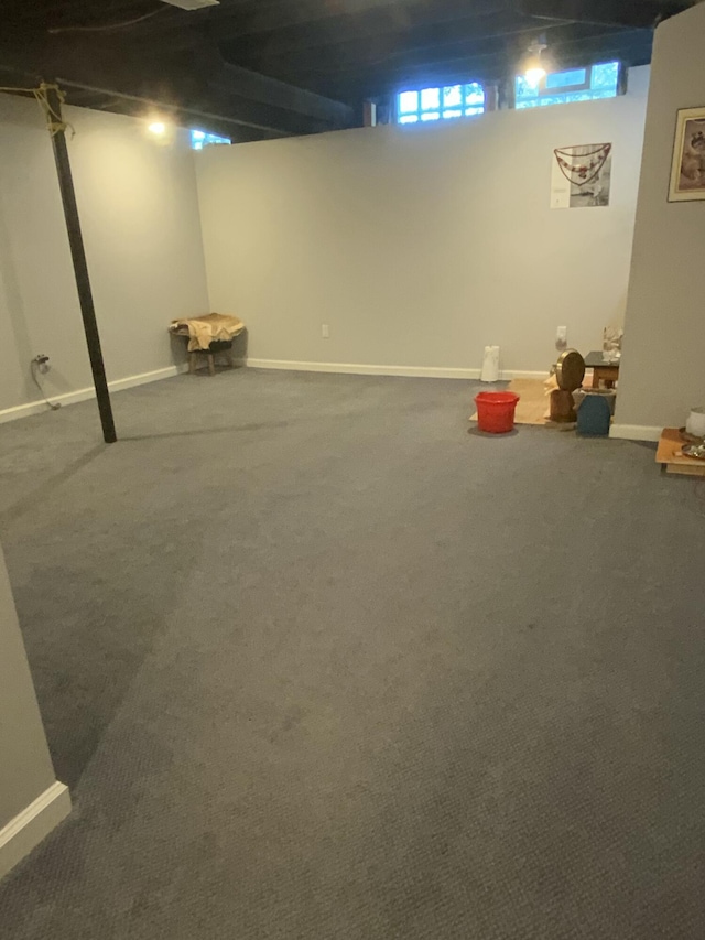 basement with carpet flooring