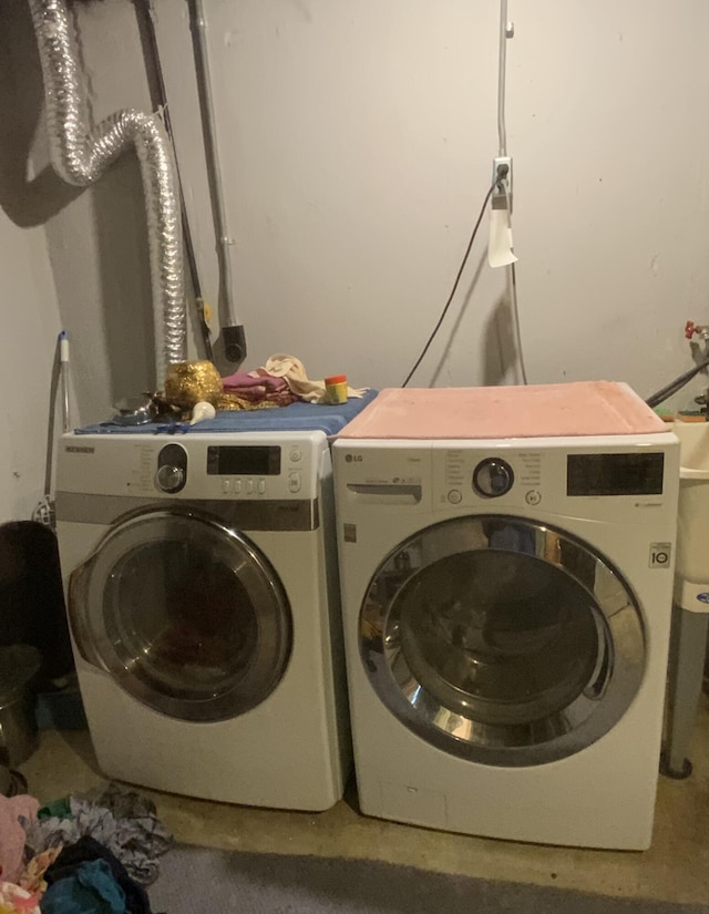 laundry room featuring washer and dryer