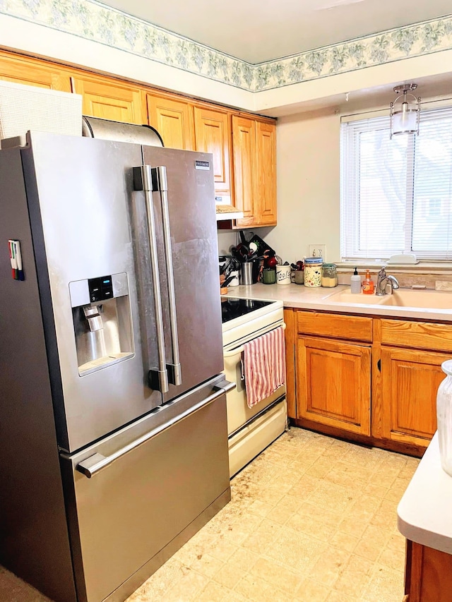 kitchen with range hood, stainless steel fridge with ice dispenser, white electric stove, and sink