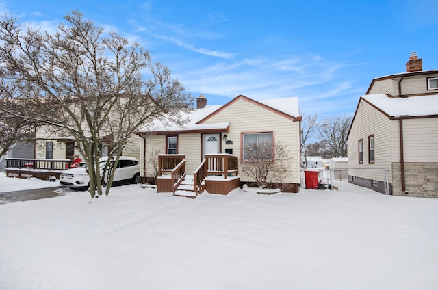 view of snow covered property