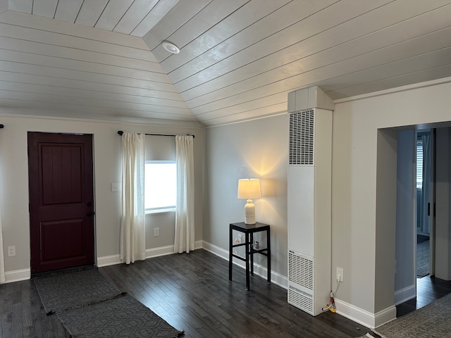 entrance foyer with dark wood-type flooring, vaulted ceiling, and wooden ceiling