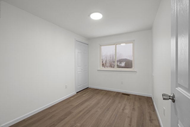 empty room featuring light hardwood / wood-style floors